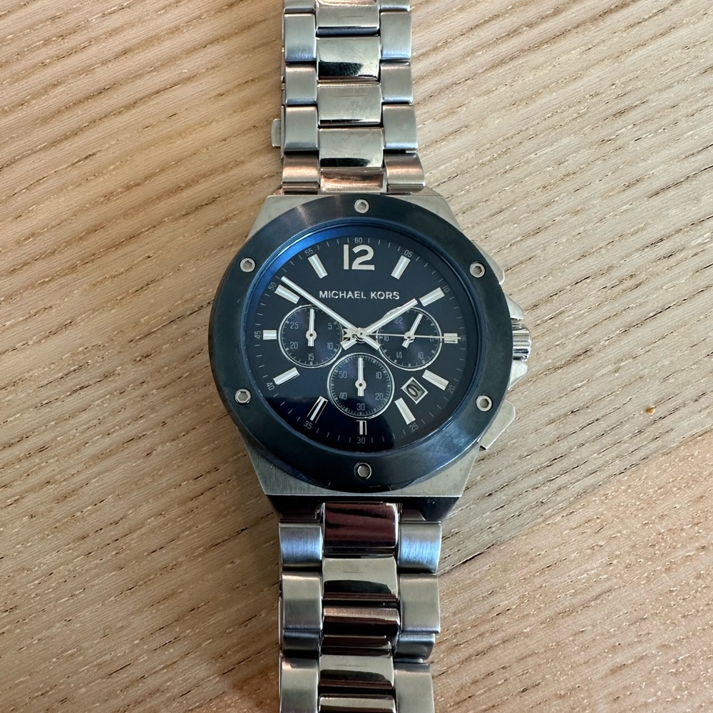 Michael Kors men’s Lennox chronograph stainless steel watch with blue face